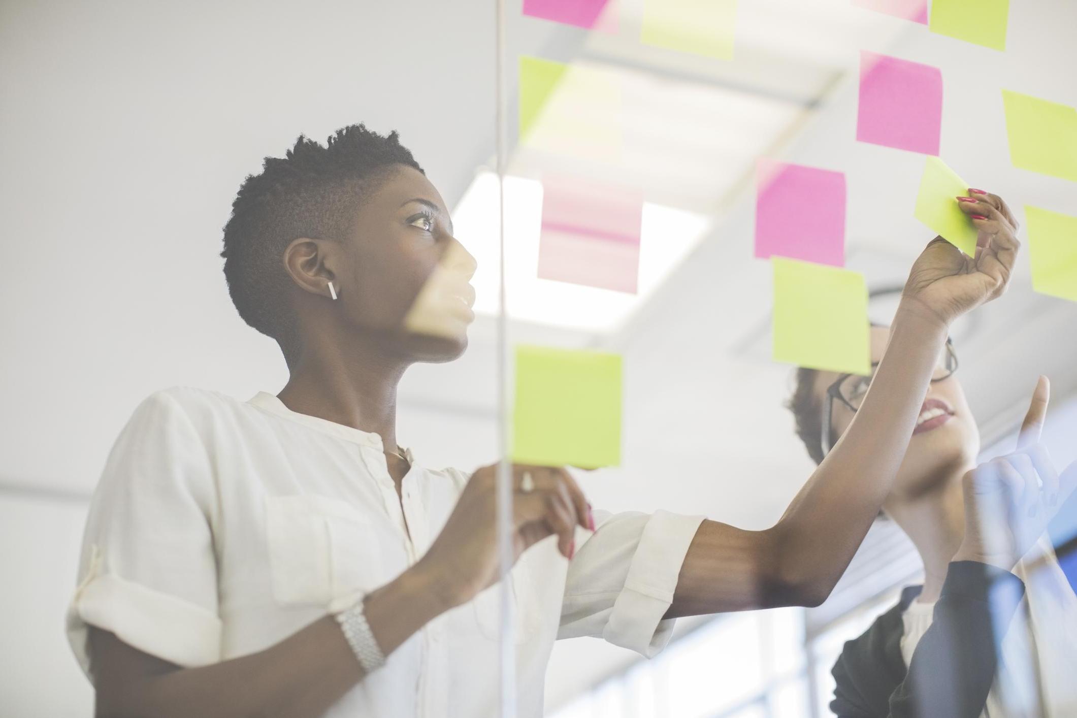 Two Females With Sticky Notes